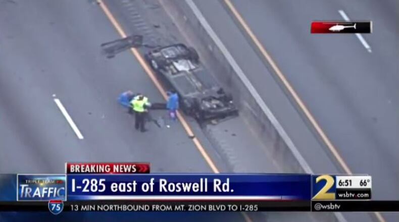 A rollover crash caused delays on the north Perimeter Wed., May 18, 2016. (Credit: WSB’s 24-hour Traffic Center)