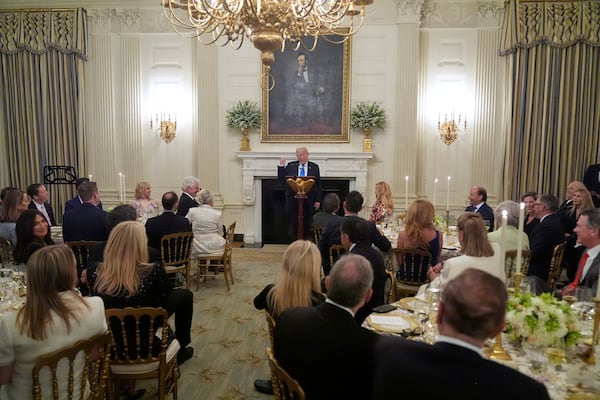 President Donald Trump speaks during a Kennedy Center board dinner in the State Dining Room at the White House, Monday, May 19, 2025, in Washington. (AP Photo/Manuel Balce Ceneta)