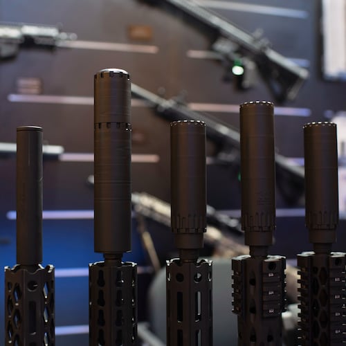 FILE - Firearms and suppressors are displayed at SHOT Show, the annual trade show for the gun industry, Jan. 21 2020, in Las Vegas. (AP Photo/Lisa Marie Pane, File)