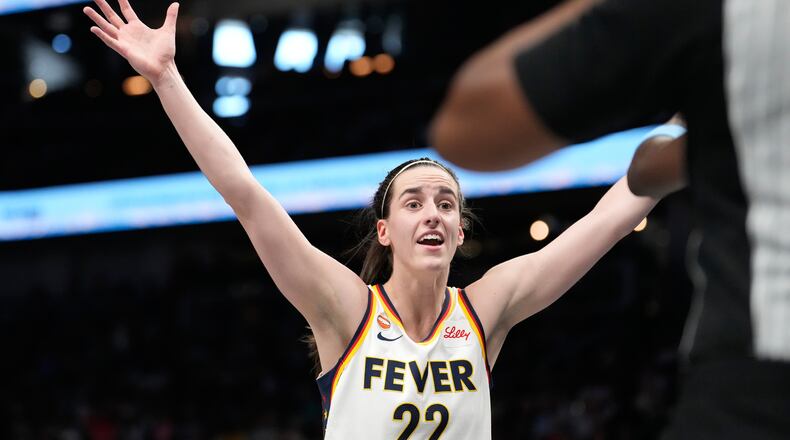 Indiana Fever guard Caitlin Clark (22) reacts in the first half of an WNBA basketball game against the Atlanta Dream Sunday, Aug. 16, 2026, in Atlanta. (AP Photo/Brynn Anderson)