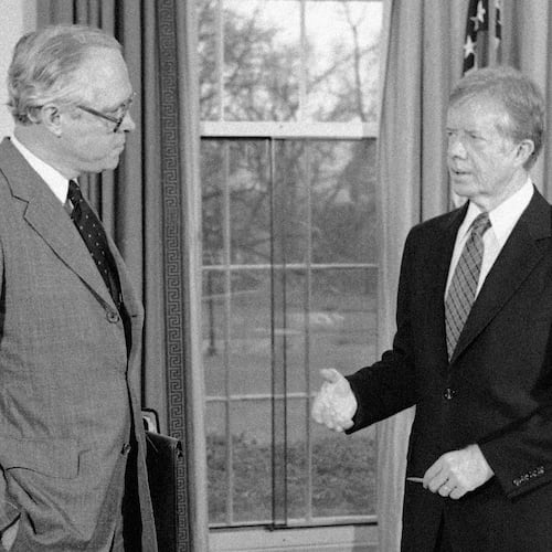 FILE - President Jimmy Carter, right, meets with Attorney General Benjamin Civiletti at the White House in Washington, Dec. 13, 1979. (AP Photo/Ira Schwarz, File)