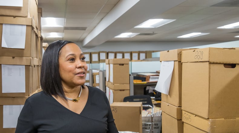 In addition to nearly 10,000 open cases, Fulton County's newly elected District Attorney Fani Willis has paralegals working full time to process cases left behind by the previous team in the office downtown Atlanta on Thursday, Feb 18, 2021.  (Jenni Girtman for The Atlanta Journal-Constitution)