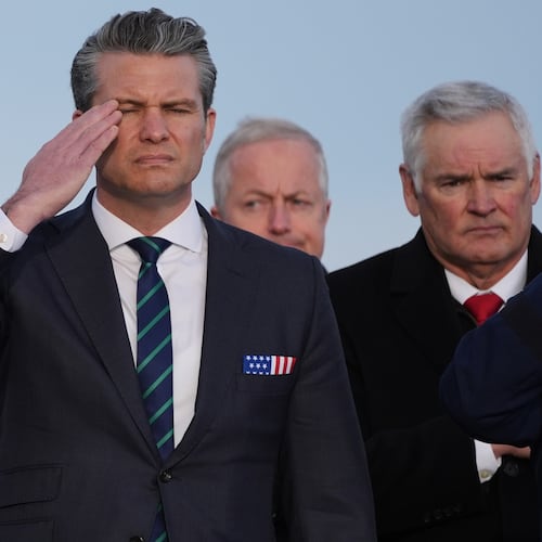 Defense Secretary Pete Hegseth salutes during a casualty return for Iowa National Guard soldiers Sgt. William Nathaniel Howard, 29, of Marshalltown, Iowa, and Sgt. Edgar Brian Torres-Tovar, 25, of Des Moines, Iowa, and civilian interpreter Ayad Mansoor Sakat, who were killed in Syria, Wednesday, Dec. 17, 2025, at Dover Air Force Base, Del. (AP Photo/Evan Vucci)
