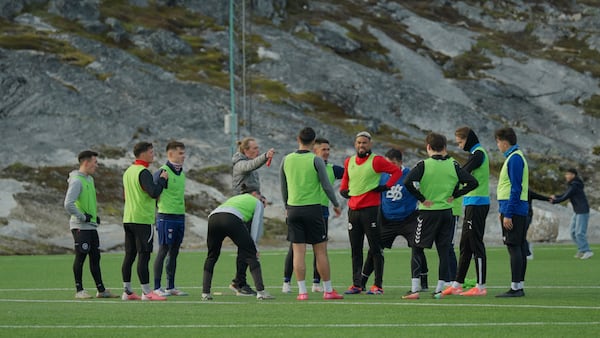 Greenland's soccer and futsal players huddle during a training session at Nuuk stadium in Nuuk, Greenland, Tuesday, June 17, 2025. (AP Photo/Kwiyeon Ha)