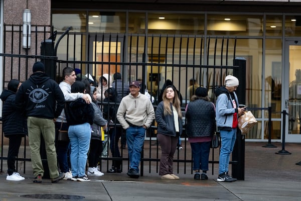 People line up outside of the Immigration and Customs Enforcement Atlanta field office in January.