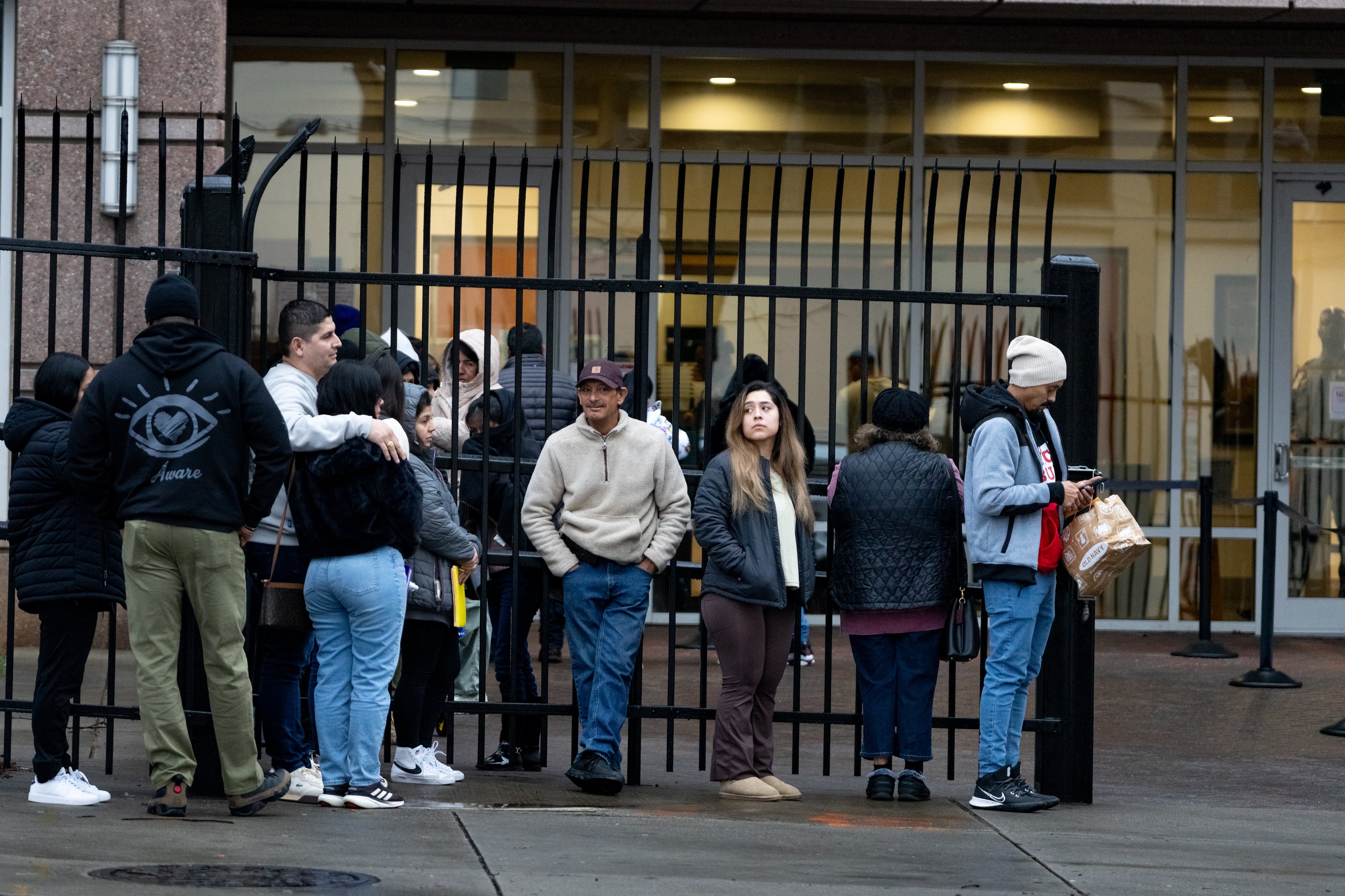 People line up outside of the Immigration and Customs Enforcement Atlanta field office in January.