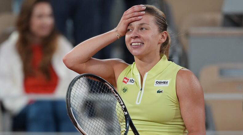 Poland's Maja Chwalinska react after winning during the semifinal tennis match against Russia's Diana Shnaider at the French Open in Paris, Thursday, June 4, 2026. (AP Photo/Thibault Camus)