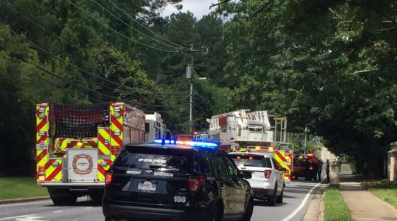 A hazmat unit has been called to the scene on a road in north Fulton County after a barrel fell off a truck.