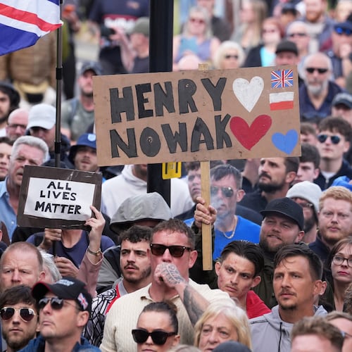 People gather to protest outside Southampton police station, Southampton, England, Tuesday June 2, 2026, after the fatal stabbing of Henry Nowak, a British teenager who was handcuffed despite claiming he was the crime victim. (Gareth Fuller/PA via AP)