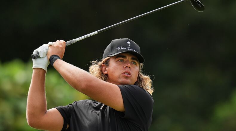 Garrick Higgo, of South Africa, tees off on the second hole during the fourth round of the Baycurrent Classic golf tournament at the Yokohama Country Club in Yokohama, near Tokyo, Sunday, Oct. 12, 2025. (AP Photo/Hiro Komae)