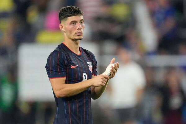 United States defender Sebastian Berhalter (8) looks to the bleachers after the team's loss in an international friendly soccer match against the Switzerland, Tuesday, June 10, 2025, in Nashville, Tenn. (AP Photo/George Walker IV)