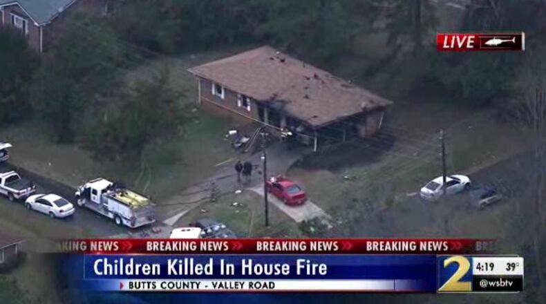 Two children were killed in a house fire in Butts County.