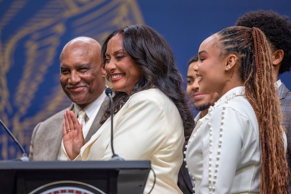 City Council President Marci Collier Overstreet is sworn in, surrounded by her family, during the inauguration day ceremony at the Georgia State University Convocation Center in Atlanta on Monday, Jan. 5, 2026. (Arvin Temkar/AJC)