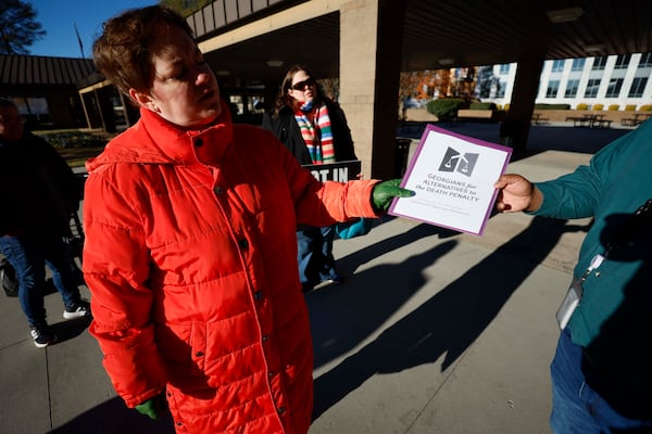 Lara Smith, interim executive director of Georgians for Alternatives to the Death Penalty, submitted a petition with 1,477 signatures to a representative of the Georgia Parole Board, requesting clemency for Stacey Humphreys. Humphreys was scheduled to be executed on Dec. 17. (Miguel Martinez/AJC)