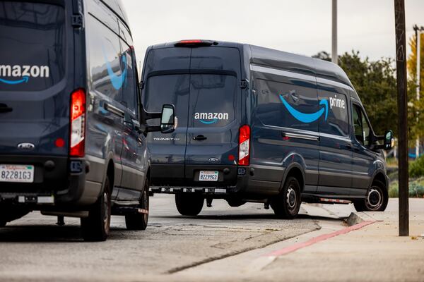 FILE — Amazon delivery trucks line up at an Amazon delivery station in Rosemead, Calif., on Jan 13, 2022. A new antitrust law, known as the American Innovation and Choice Online Act, would bar Big Tech companies like Amazon from prioritizing their own products over those of their rivals. (Roger Kisby/The New York Times)