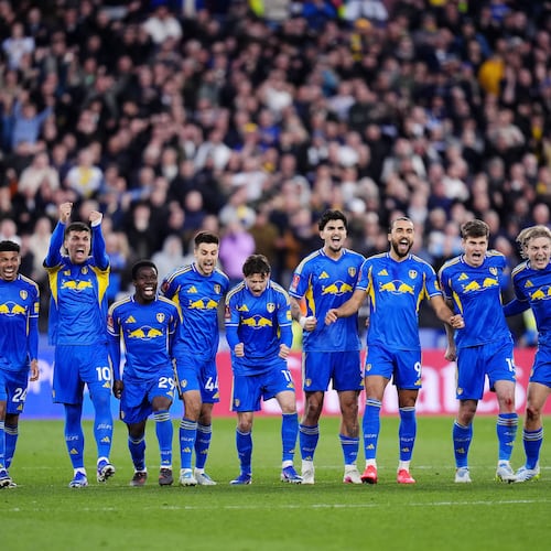 Leeds United's Dominic Calvert-Lewin, third right, and teammates celebrate in the penalty shoot-out during the English FA Cup quarterfinal soccer match between West Ham United and Leeds United, in London, Sunday April 5, 2026. (John Walton/PA via AP)