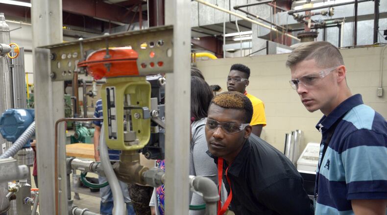 (Les Hassell/The News-Journal via AP)