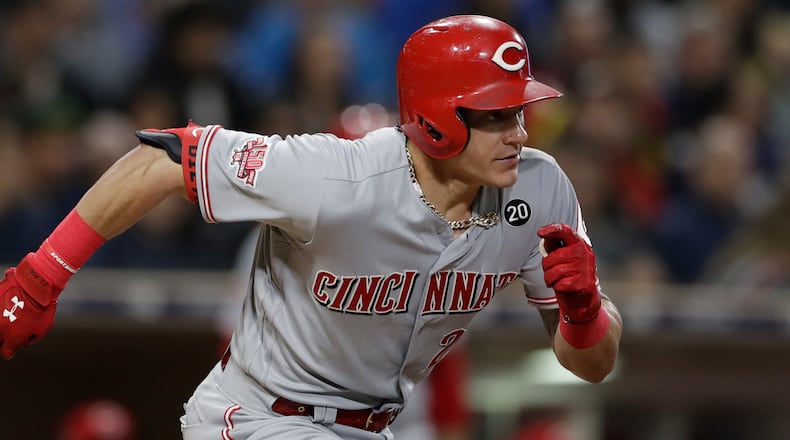 Cincinnati Reds' Scott Schebler bats during the ninth inning of a baseball game against the San Diego Padres Friday, April 19, 2019, in San Diego.