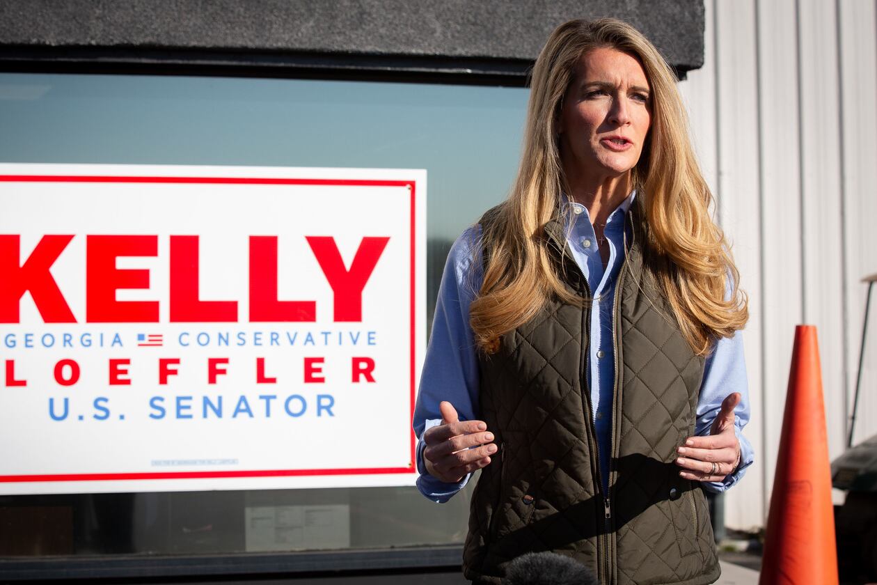 United States Senator Kelly Loeffler talks with the media for a quick press conference at Gwinnett County Airport Monday, November 2, 2020. STEVE SCHAEFER / SPECIAL TO THE AJC