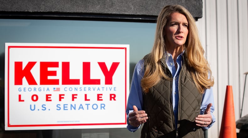 United States Senator Kelly Loeffler talks with the media for a quick press conference at Gwinnett County Airport Monday, November 2, 2020. STEVE SCHAEFER / SPECIAL TO THE AJC