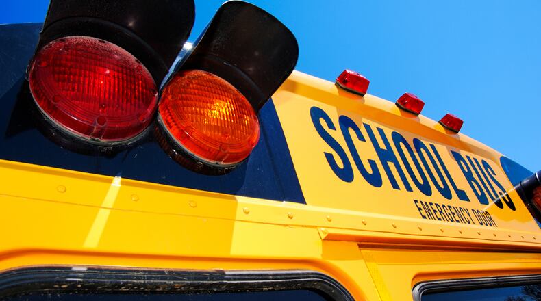 A Forsyth County school bus driver faces a DUI charge after she allegedly hit another car with dozens of students aboard her bus, officials said.