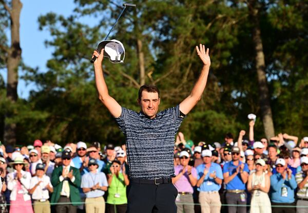 Scottie Scheffler reacts after winning the Masters on Sunday, April 10, 2022, in Augusta. (Hyosub Shin / Hyosub.Shin@ajc.com)