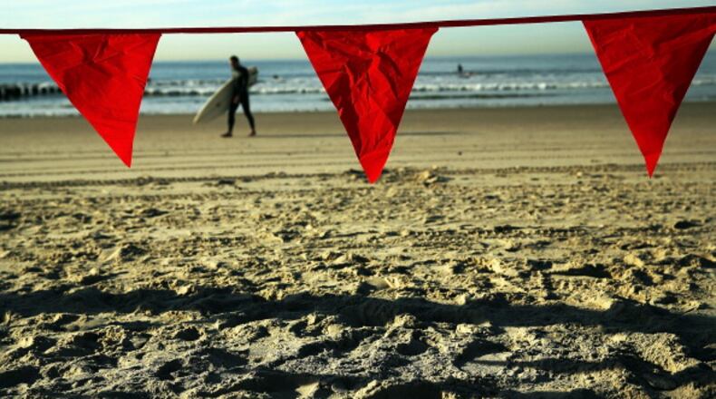 Red flags usually are used as warning signs in relationships and in life, but the emoji recently has become a means for people on Twitter to share objectionable actions. (AJC file photo)