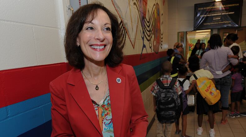 Marietta superintendent Emily Lembeck smiles at Hickory Hills Elementary School on the first day of school on Thursday, August 9, 2012.