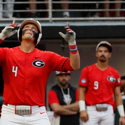 Georgia Bulldogs infielder Michael O’Shaughnessy reacts at home plate after his solo home run during the eighth inning of their NCAA Regional final game at Foley Field on Sunday, May 31, 2026, in Athens. (Miguel Martinez/AJC)
