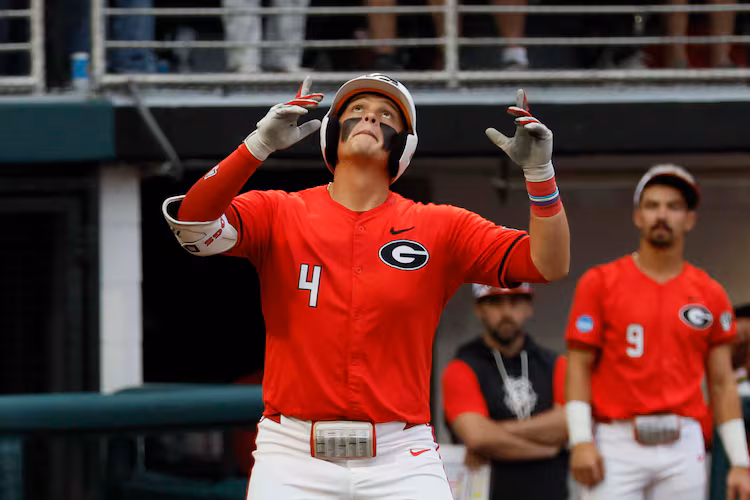 Georgia Bulldogs infielder Michael O’Shaughnessy (4) reacts at home plate after his solo home run during the eighth inning of their NCAA Regional final game at Foley Field on Sunday, May 31, 2026, in Athens. (Miguel Martinez/AJC)