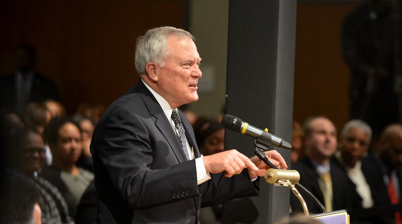JANUARY 21, 2014 STONE MOUNTAIN Governor Nathan Deal makes remarks after Dr Mark Elgart, CEO of AdvancED presented results of a staff visit to the Dekalb County School Board and a standing room only crowd Tuesday, January 21, 2014. The Southern Association of Colleges and Schools has cleared the DeKalb school district from its probationary status saying the threat to its accreditation is no longer eminent. However, Elgart, the SACS chief, says the district is still under watch and they are now under something called accreditation warning. Gov. Nathan Deal was also there to applaud the school district on its progress. Deal removed six board members last year after the district was placed on probation for mismanagement. 'KENT D. JOHNSON/KDJOHNSON@AJC.COM Gov. Deal speaks to the DeKalb school board in January after SACS announced the district was no longer on probation, but under accreditation warning. (AJC Photo)