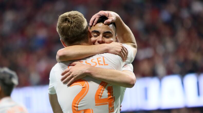 April 7, 2018.  Atlanta United Miguel Almiron #10 hugs Julian Gressel after he scored the first goal of the team.