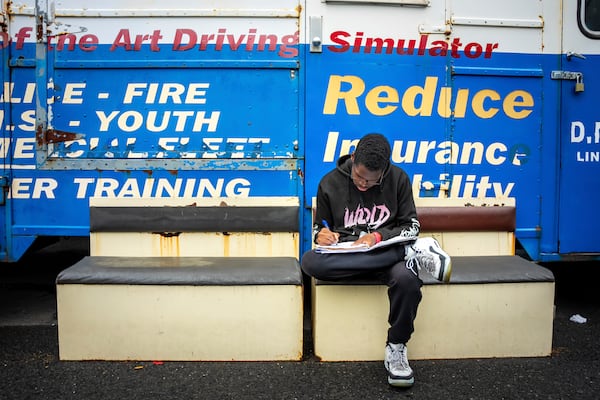 Solane Ellis studies at the Driving Academy on Tuesday, June 10, 2025 in Linden, N.J., where students prepare to obtain a Commercial Driver’s License (CDL) with multilingual instructors. (AP Photo/Angelina Katsanis)