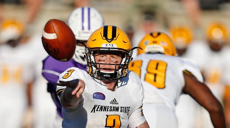 Quarterback Chandler Burks pitches the ball on an option run. The sophomore helped the Owls rush for 393 yards and six touchdowns in their 10-point win Saturday. (Jeremy Brevard/KSUOwls.com)