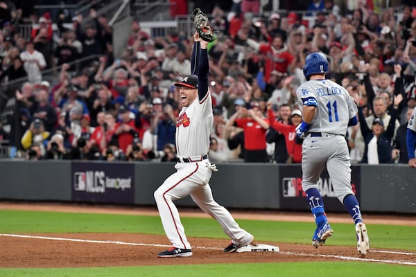 Braves first baseman Freddie Freeman reacts after retiring Dodgers left fielder AJ Pollock for the final out in the Braves' 4-2 win in Game 6 of the National League Championship Series. (Hyosub Shin / Hyosub.Shin@ajc.com)