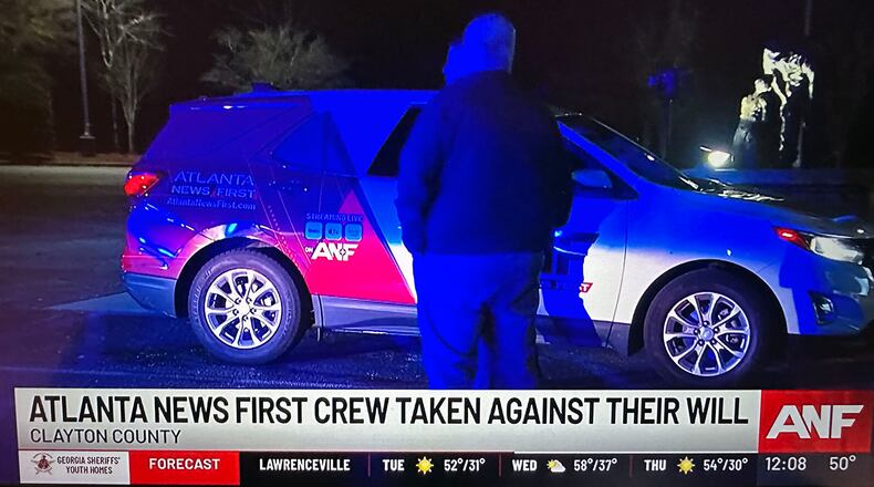 An Atlanta News FIrst news crew was taken hostage on Monday night by a man who threatened to shoot them, but police arrested him without incident. (Photo: ANF)