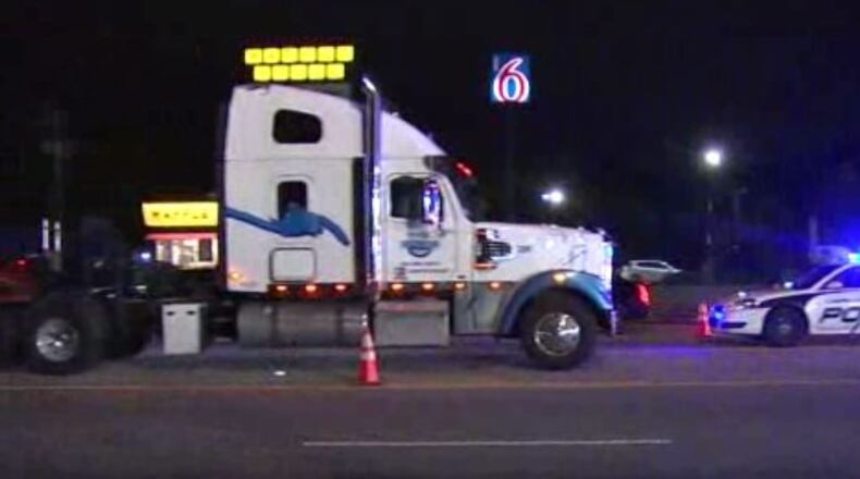 The semitruck was turning left onto I-85 when it hit the motorcycle, according to South Fulton police.