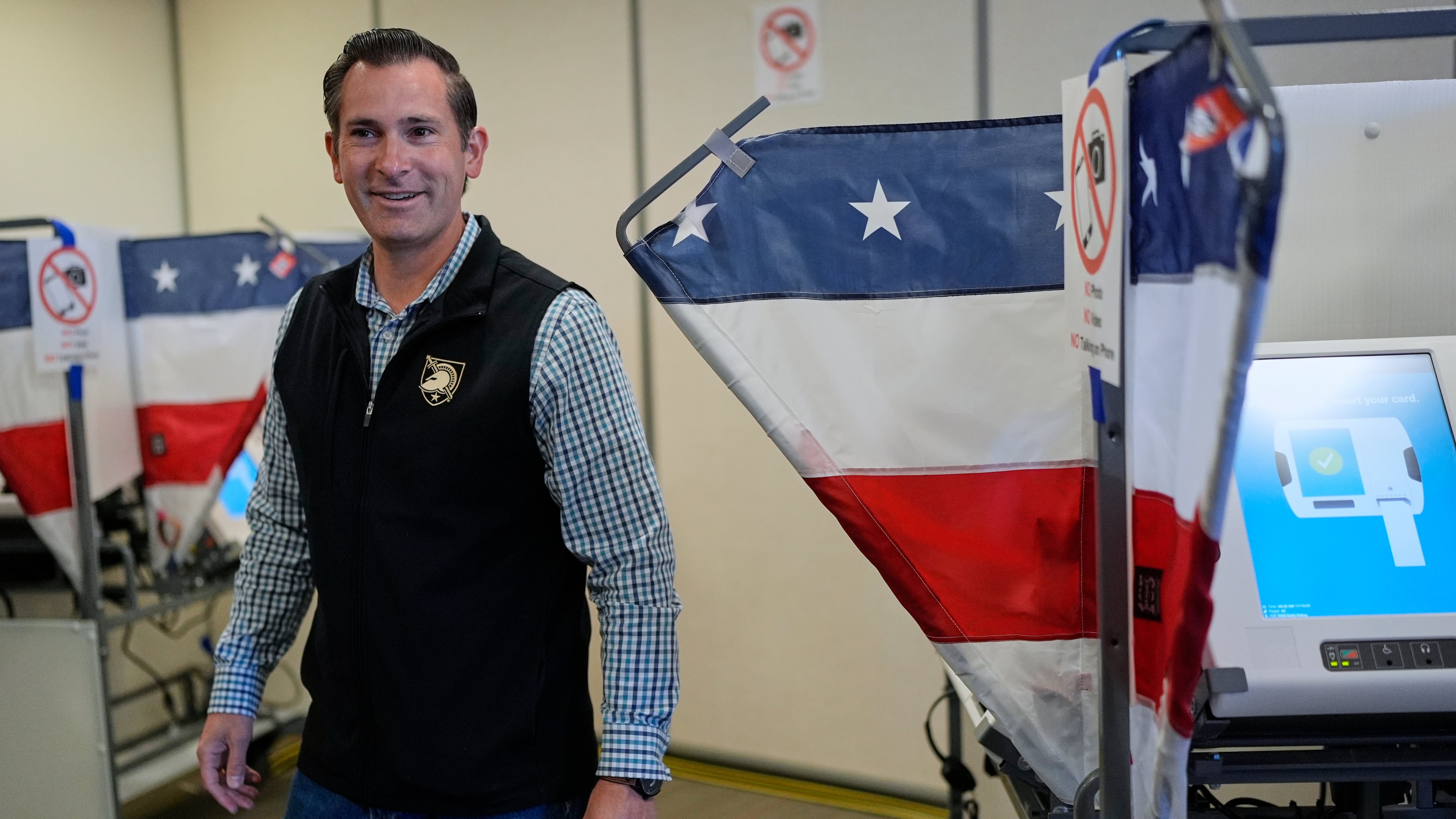 Republican congressional candidate Matt Van Epps casts his ballot at an early voting site in the special election for the seventh district, Wednesday, Nov. 12, 2025, in Nashville, Tenn. (AP Photo/George Walker IV)