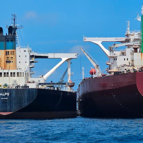 This handout photo from United Against Nuclear Iran shows two oil tankers making a ship-to-ship transfer of Iranian oil in the Eastern Outer Port Limits (EOPL), 70 kilometers off Malaysia's coast in international waters on 28 July 2025. (Charlie Brown/United Against Nuclear Iran via AP)
