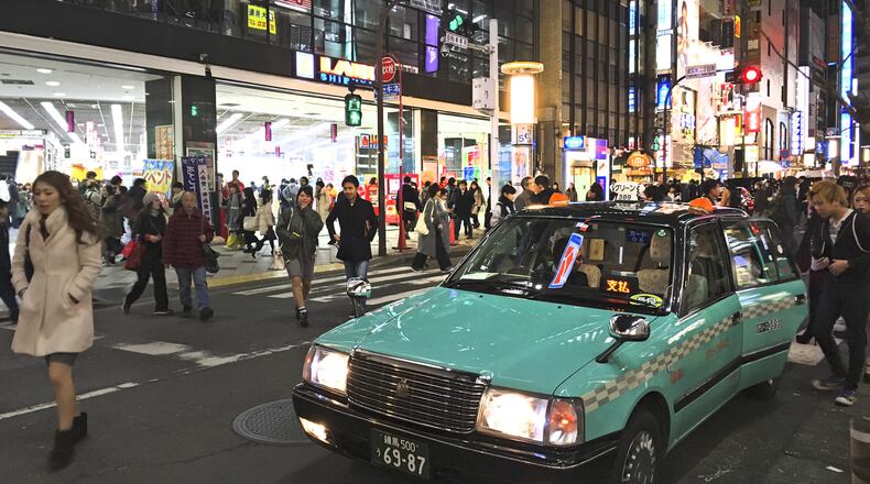 Even with its bustle, Toyko is a friendly place, filled with people who take time to help strangers. (Amelia Rayno/Minneapolis Star Tribune/TNS)