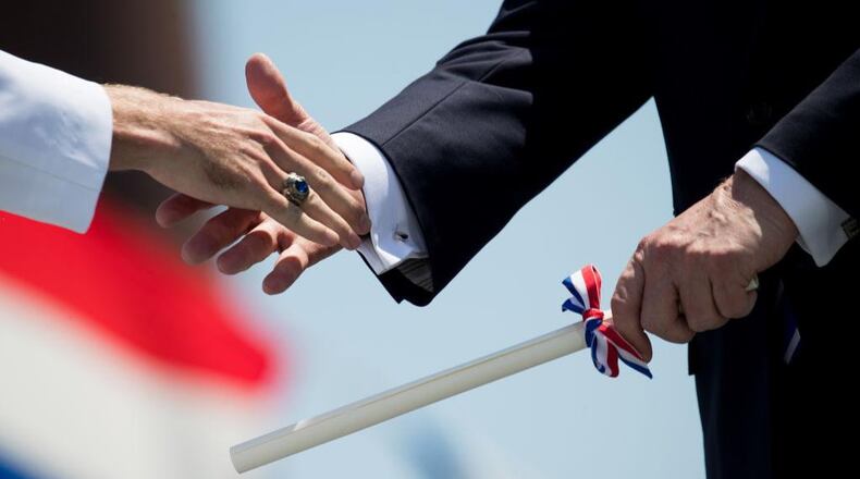 A woman in Texas received an emotionally charged graduation photo from her husband.
