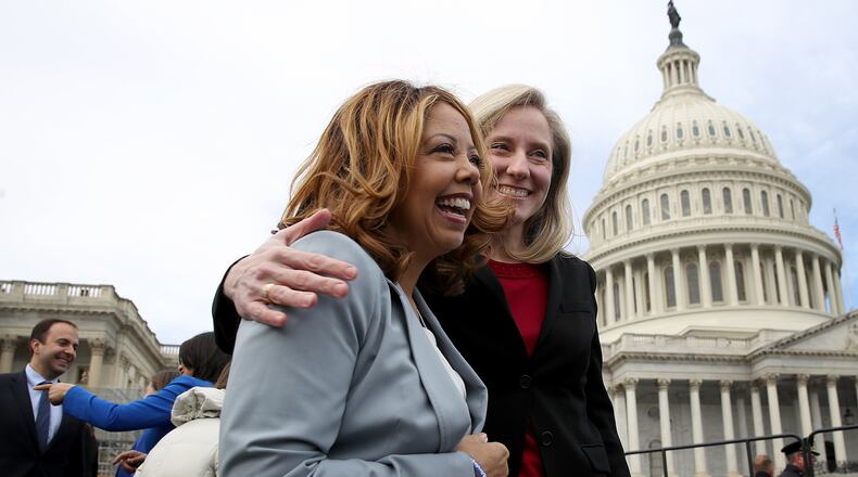 Congresswomen-elect Lucy McBath, D-Ga., (left) and  Abigail Spanberger, D-Va., meet in front of the U.S. Capitol following an official class picture of new representatives on November 14, 2018 in Washington, D.C.  (Photo by Win McNamee/Getty Images)