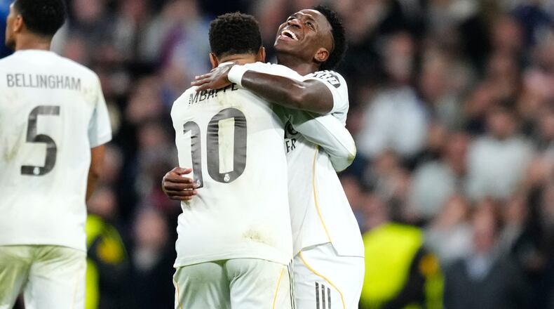 Real Madrid's Vinicius Junior celebrates his side's fifth goal during the Champions League opening phase soccer match between Real Madrid and Monaco in Madrid on Tuesday, Jan. 20, 2026. (AP Photo/Jose Breton)