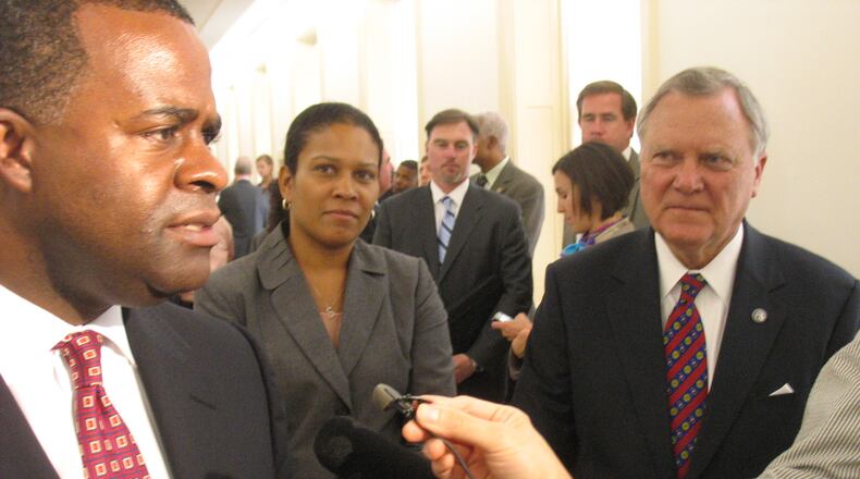 Atlanta Mayor Kasim Reed, left, and Gov. Nathan Deal speak to reporters after meeting with members of Georgia's congressional delegation on Capitol Hill. The bipartisan pair met with a bipartisan group of lawmakers to seek ways to deepen the Port of Savannah.