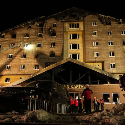 FILE - Firefighters and emergency teams work after a fire that broke out at a hotel in the ski resort of Kartalkaya, located in Bolu province, northwest Turkey, on Jan. 21, 2025. (AP Photo/Francisco Seco, File)