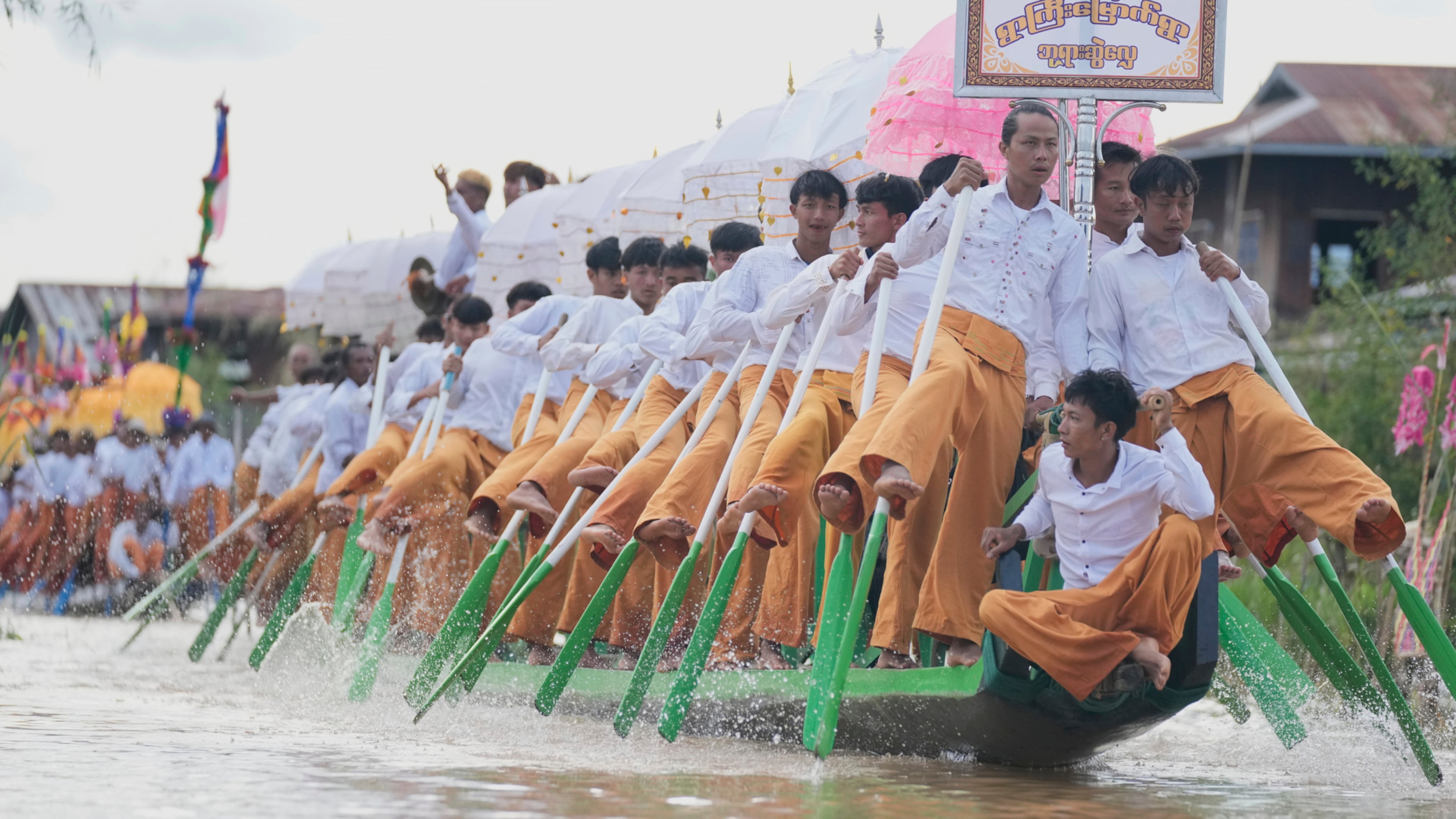 Ethnic Intha people perform during Phaung Daw Oo pagoda festival in Inle Lake, southern Shan State, Myanmar, Tuesday, Sept. 23, 2025. (AP Photo/Thein Zaw)
