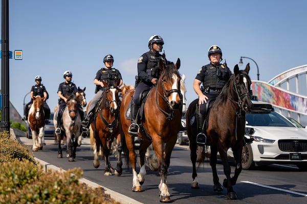Atlanta's and Cobb mounted patrol units train in downtown Atlanta on Thursday, March 26, 2026, in preparation for this summer's FIFA World Cup in the city. (Ben Hendren for the AJC)