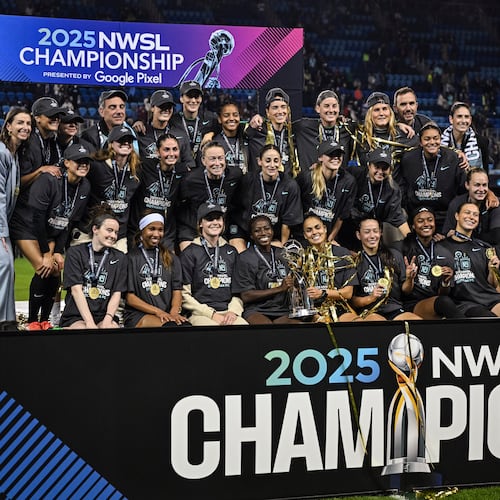 NJ/NY Gotham FC pose with the NWSL championship trophy after defeating the Washington Spirit in a NWSL women’s championship soccer match, Saturday, Nov. 22, 2025, in San Jose, Calif. (AP Photo/Justine Willard)