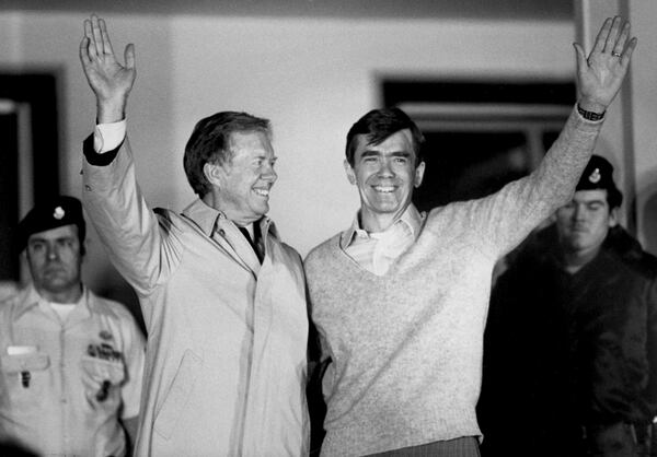 Then-President Jimmy Carter stands with Bruce Laingen, who was held hostage while serving at the U.S Embassy in Tehran in 1981. Carter became the 39th president on a promise of national healing after the wounds of Watergate and Vietnam. (D. Gorton/The New York Times)
                      