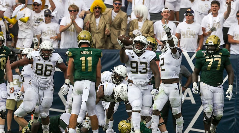 Georgia Tech Yellow Jackets defensive lineman T.K. Chimedza (93) celebrates a fumble recovery during the second half. (Alyssa Pointer/alyssa.pointer@ajc.com)